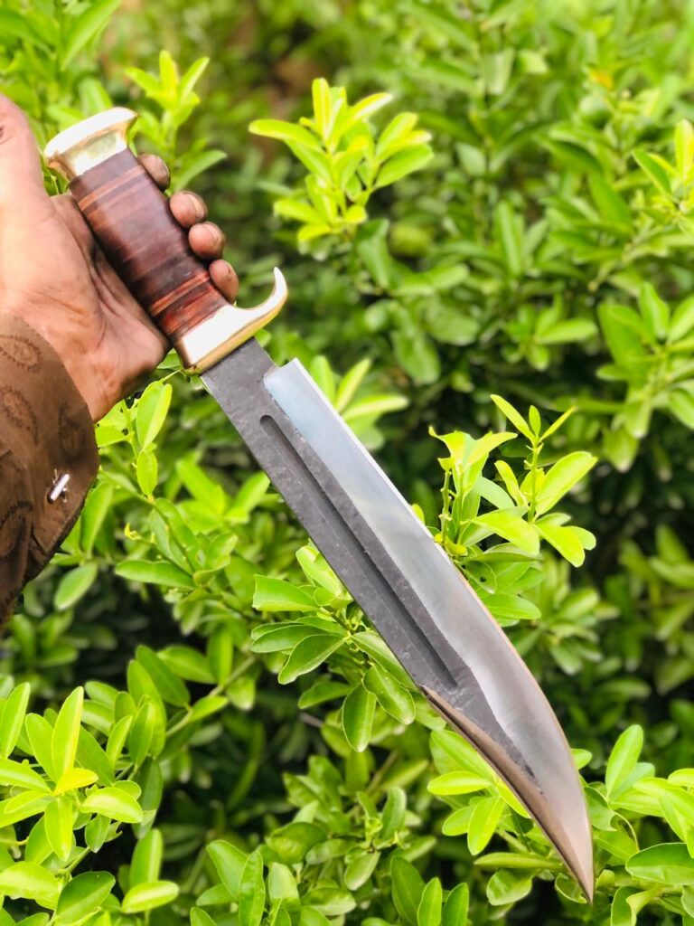 Crocodile Dundee Bowie Knife Crocodile Dundee knife replica Mick Dundee knife Bowie knife history Famous movie knives Custom Bowie knife Australia Best survival knife designs Outback hunting knife Paul Hogan knife Crocodile Dundee Oversized Bowie knife